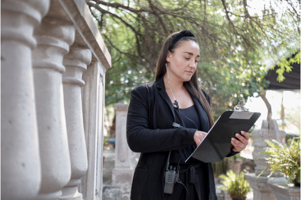 Wedding planner reviewing wedding details
